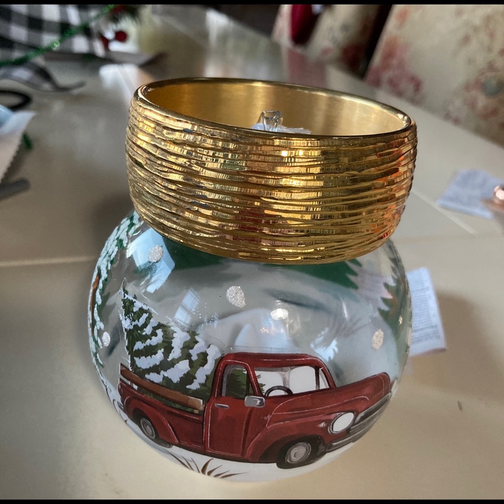 3 Goldtone bangle bracelets